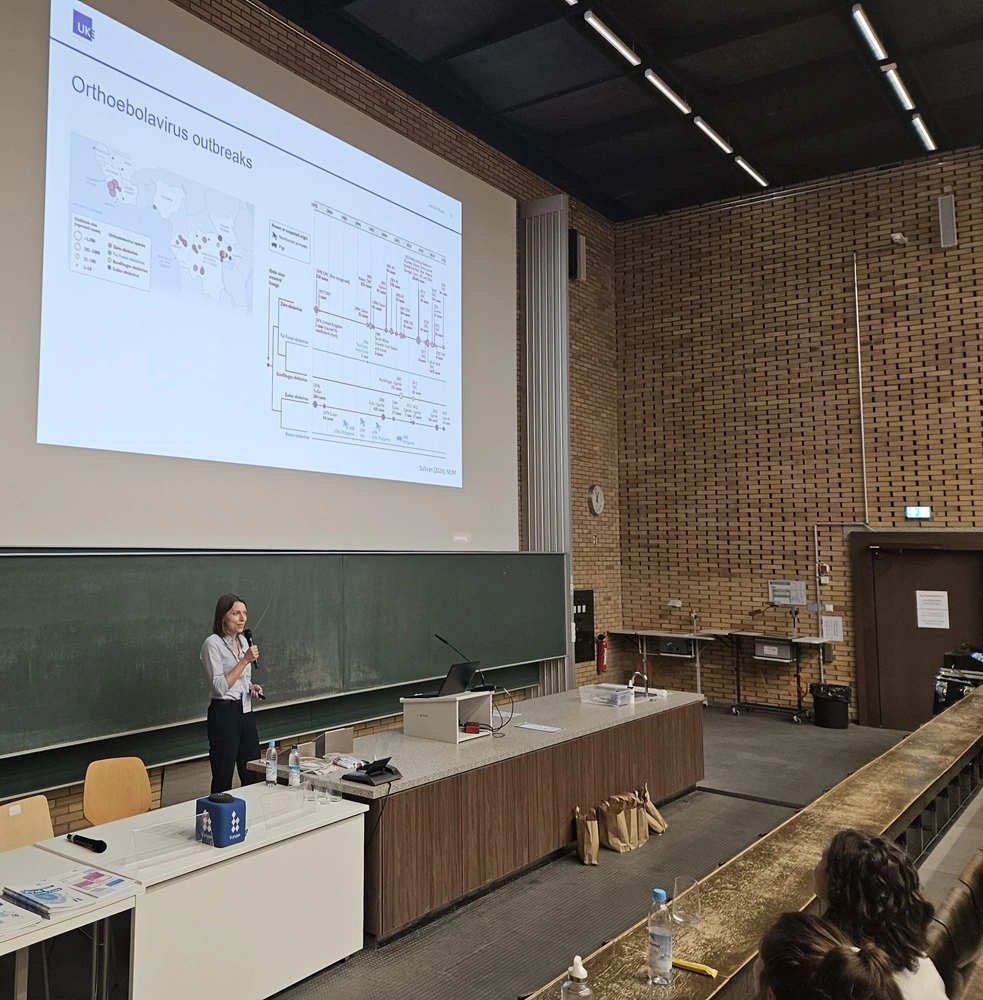 Leonie Mayer presenting with an open slide at her back