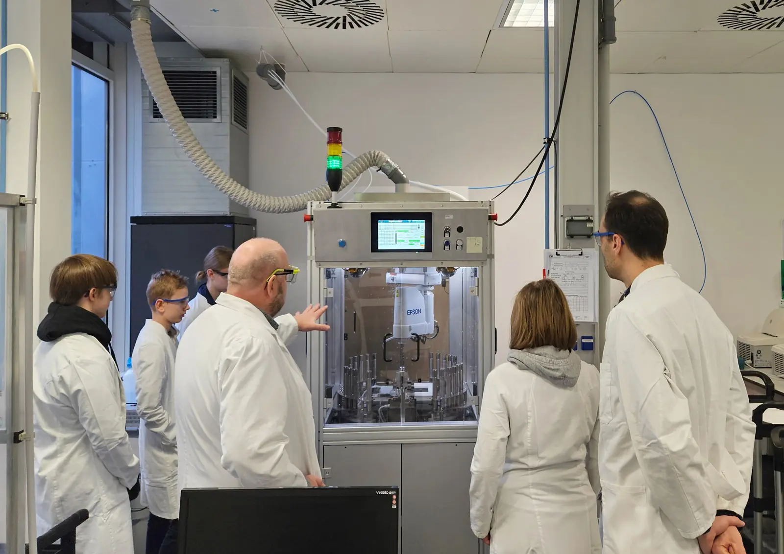 Career orientation visit 2024 at peptides & elephants. Students exploring the biotechnology industry and learning about professional paths in peptide research and scientific manufacturing.
